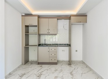 Новая трехкомнатная квартира, 75м², в комплексе премиум класса в 200м от моря в Махмутларе, Алания ID-16897 фото-5