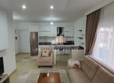 Ready-to-move-in apartment 1+1, 70m², in a residence with good facilities, by the sea in Mahmutlar, Alanya ID-16904 фото-1