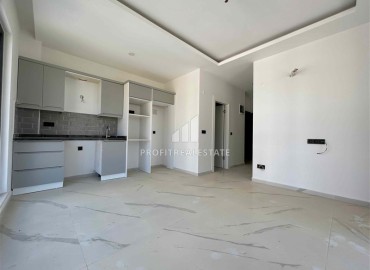 One bedroom apartment, 55m², in a new premium residence in the center of Mahmutlar, Alanya ID-16905 фото-3