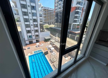 One bedroom apartment, 55m², in a new premium residence in the center of Mahmutlar, Alanya ID-16905 фото-11