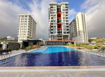 View furnished one bedroom apartment, 55 m², in a new luxury residence with an excellent location in Mahmutlar, Alanya ID-16907 фото-1