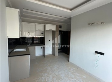 New apartment 1+1, 55m², fully finished and with a kitchen unit, in a modern residential residence, Oba, Alanya ID-16915 фото-4