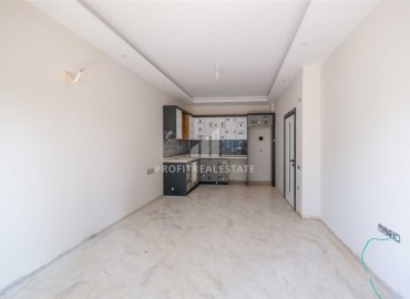 Inexpensive 1+1 apartment at the last stage of construction, 450 m from the sea, in a residence with facilities, Mahmutlar, Alanya ID-16921 фото-4