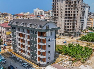 Inexpensive 1+1 apartment at the last stage of construction, 450 m from the sea, in a residence with facilities, Mahmutlar, Alanya ID-16921 фото-16