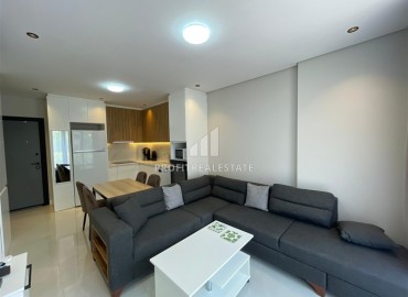 Stylish furnished one-bedroom apartment, 40m², with access to the garden, in a new building near Cleopatra Beach, Alanya ID-16923 фото-2