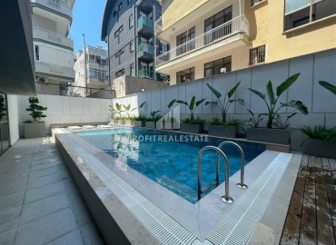 Stylish furnished one-bedroom apartment, 40m², with access to the garden, in a new building near Cleopatra Beach, Alanya ID-16923 фото-13