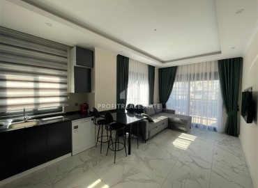 One-bedroom apartment, 50m² in a residence under construction, in the center of Alanya, 150m to the sea ID-11849 фото-2