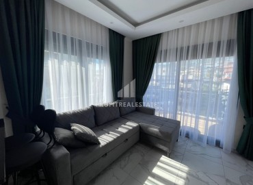 One-bedroom apartment, 50m² in a residence under construction, in the center of Alanya, 150m to the sea ID-11849 фото-3