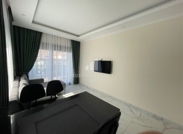 One-bedroom apartment, 50m² in a residence under construction, in the center of Alanya, 150m to the sea ID-11849 фото-4