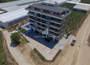 Stylish one bedroom apartment, 52m², in a new affordable residence with a swimming pool in Kargicak, Alanya, at an attractive price ID-16940 фото-1