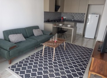 Stylish one bedroom apartment, 52m², in a new affordable residence with a swimming pool in Kargicak, Alanya, at an attractive price ID-16940 фото-2