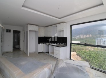 Completed one bedroom apartment, 43.5 m², with magnificent views in a new luxury residence in Mahmutlar ID-16961 фото-3