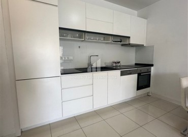 Ready to move in, one bedroom apartment, 60m², 100m from the sea in the Alanya - Tosmur area ID-16976 фото-5