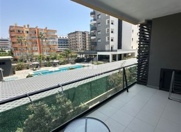 Ready to move in, one bedroom apartment, 60m², 100m from the sea in the Alanya - Tosmur area ID-16976 фото-11