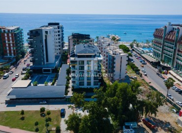 Ready to move in, one bedroom apartment, 60m², 100m from the sea in the Alanya - Tosmur area ID-16976 фото-13