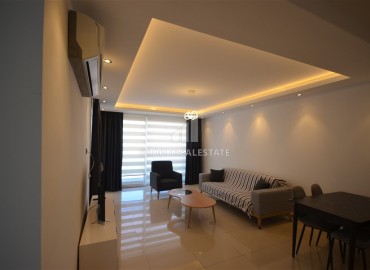 Stylish two bedroom apartment 111 m2, with a designer interior, 50 meters from the sea, Tosmur, Alanya ID-13693 фото-2