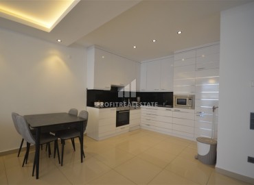 Stylish two bedroom apartment 111 m2, with a designer interior, 50 meters from the sea, Tosmur, Alanya ID-13693 фото-4