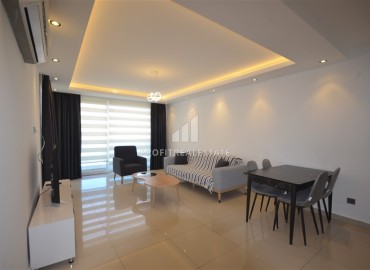 Stylish two bedroom apartment 111 m2, with a designer interior, 50 meters from the sea, Tosmur, Alanya ID-13693 фото-5