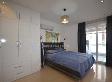 Stylish two bedroom apartment 111 m2, with a designer interior, 50 meters from the sea, Tosmur, Alanya ID-13693 фото-6