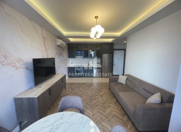 One bedroom apartment, 53.5 m², in a new premium class residence on the first coastline in the center of Alanya ID-16993 фото-3