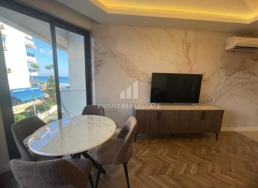 One bedroom apartment, 53.5 m², in a new premium class residence on the first coastline in the center of Alanya ID-16993 фото-5