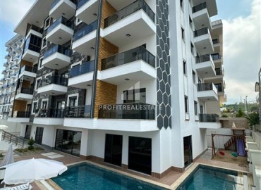 Apartment 1+1, 50m², in a residence with a winter pool in the east of Mahmutlar, Alanya, at a great price ID-17007 фото-1