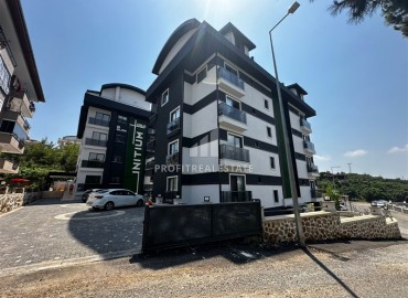 One bedroom apartment, 55m², in a new building with facilities in the Oba area, Alanya ID-17011 фото-1