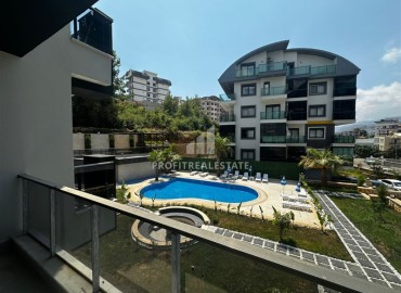 One bedroom apartment, 55m², in a new building with facilities in the Oba area, Alanya ID-17011 фото-9