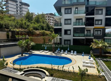 One bedroom apartment, 55m², in a new building with facilities in the Oba area, Alanya ID-17011 фото-10