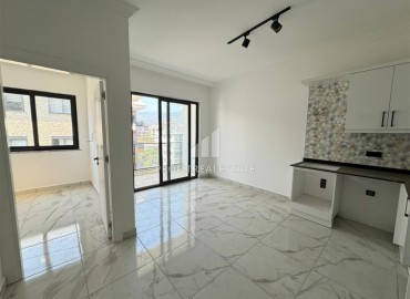 Nice one bedroom apartment, 55m², in a new residence with a winter pool in the Oba area, Alanya ID-17015 фото-2