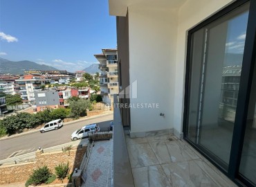 Nice one bedroom apartment, 55m², in a new residence with a winter pool in the Oba area, Alanya ID-17015 фото-15