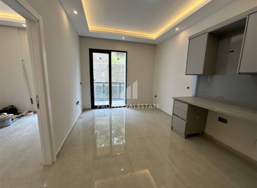 One bedroom apartment, 47m², in a residence with a swimming pool at the final stage of construction in the Alanya Hasbahce area ID-17039 фото-5