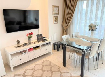 Furnished one bedroom apartment, 55m² in a cozy residence in a quiet area of Alanya - Cikcilli ID-17055 фото-3