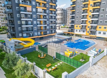 Новая трехкомнатная квартира, 72м², с потрясающим видом в комплексе премиум класса в Махмутларе, Алания ID-17066 фото-1