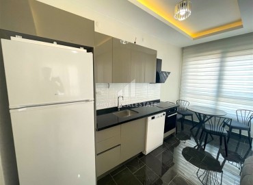 spacious one-bedroom apartment 60 m² with large windows, unfurnished, in a new building with facilities, Mahmutlar, Alanya ID-16603 фото-4