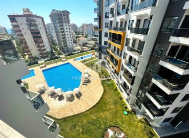 spacious one-bedroom apartment 60 m² with large windows, unfurnished, in a new building with facilities, Mahmutlar, Alanya ID-16603 фото-11