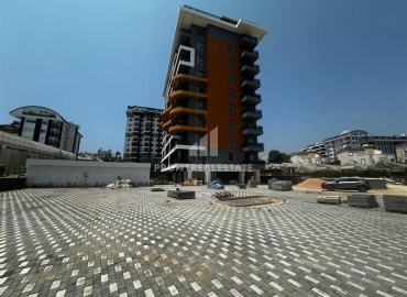 One bedroom apartment, 65m², in a premium class residence under construction in Mahmutlar, 800m from the sea ID-12589 фото-4