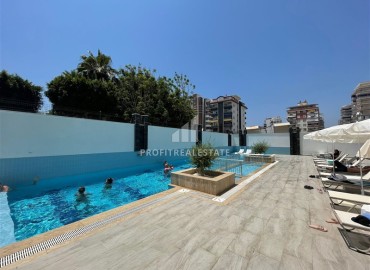 Stylish one bedroom apartment, 52m², in a premium residence with an excellent location in Mahmutlar, Alanya ID-17087 фото-10