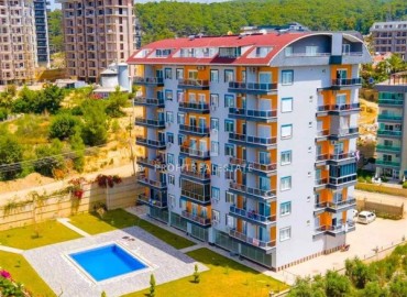 Меблированная квартира с одной спальней, 60м², в комфортабельной новостройке в Авсалларе, Алания ID-17198 фото-13