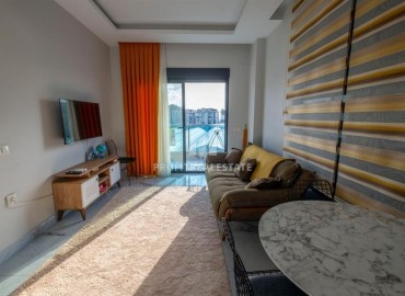 Affordable furnished one bedroom apartment, 55m², in a new building with a swimming pool in Mahmutlar, Alanya ID-17052 фото-1