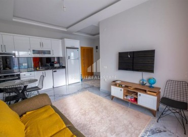 Affordable furnished one bedroom apartment, 55m², in a new building with a swimming pool in Mahmutlar, Alanya ID-17052 фото-3