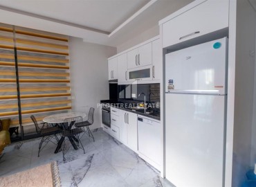 Affordable furnished one bedroom apartment, 55m², in a new building with a swimming pool in Mahmutlar, Alanya ID-17052 фото-5