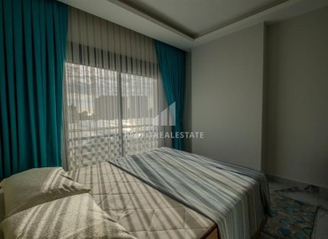 Affordable furnished one bedroom apartment, 55m², in a new building with a swimming pool in Mahmutlar, Alanya ID-17052 фото-11