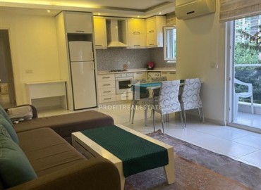 Меблированная квартира с одной спальней, 75м², на центральной улице в 400м от моря в Махмутларе, Алания ID-17414 фото-4