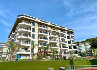 Luxurious one-bedroom apartment, 65m², with sea views in a premium residence, in Kargicak, Alanya ID-15414 фото-1