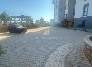 Комфортабельная квартира с одной спальней, 55м², в новом комплексе премиум класса в районе Оба, Алания ID-17444 фото-18