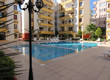 Inexpensive one bedroom apartment, with furniture and appliances, 250 meters from the sea, Mahmutlar, Alanya, 50 m2 ID-14964 фото-1