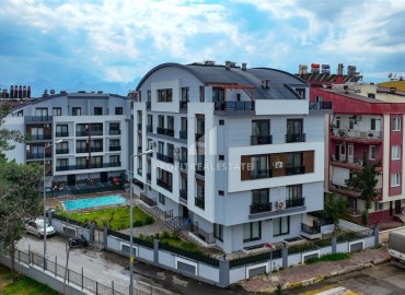 Меблированная двухкомнатная квартира, 55м², в современном комплексе с бассейном в Анталии, район Кепез ID-17502 фото-1