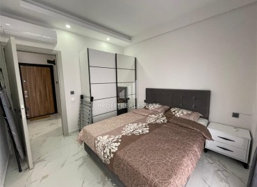 Апартаменты с одной спальней, 50м², в комфортабельном комплексе, в 550м от моря в районе Тосмур, Алания ID-17528 фото-9