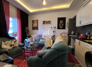 Меблированная двухкомнатная квартира, 50м², в новом комплексе с бассейном на центральной улице Махмутлара, Алания ID-17619 фото-4